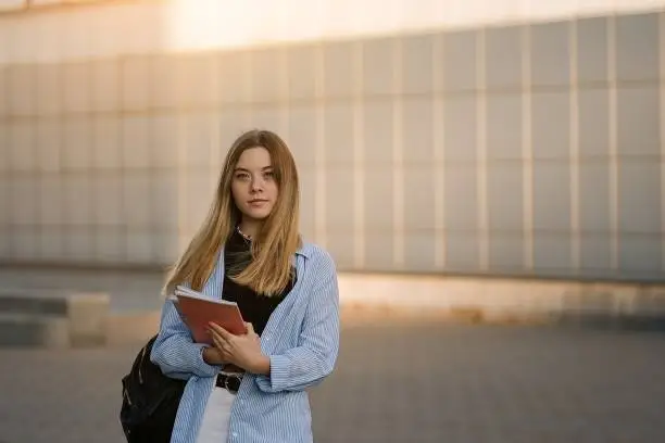 Portrait teenage student girl happy going to college or school