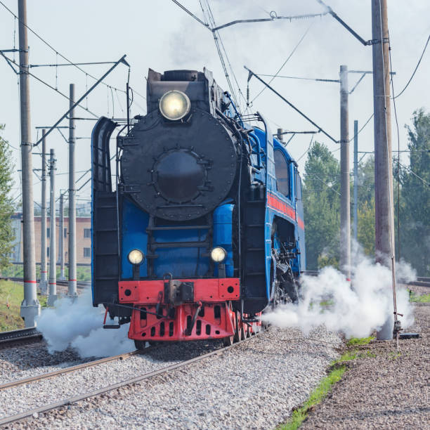 istock Steam retro train departs from the station. 1338662658