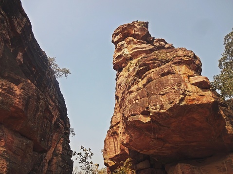 Large rock in the lush bushveld landscape in the Kruger National Park in South Africa