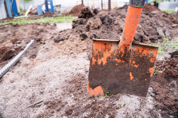 istock Dirty shovel dig in sand 1338665759