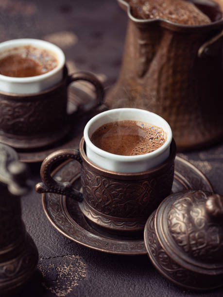 istock Two cups of Turkish coffee on stone background 1338665898