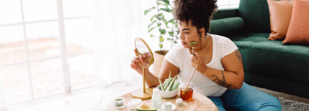 istock Beautiful healthy woman doing skin care routine at home 1338668024