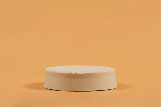 istock Abstract minimal scene with geometrical form. Cylinder podium on beige background. Abstract background. Scene to show cosmetic podructs. 1338668305