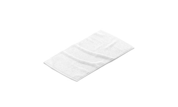 Blaank white crumpled small towel mockup, side view Blaank white crumpled small towel mockup, side view, 3d rendering. Empty fabric unfolded bath surface mock up, isolated. Clear wipe terry for swimming or shower hygiene template. terry towel stock pictures, royalty-free photos & images