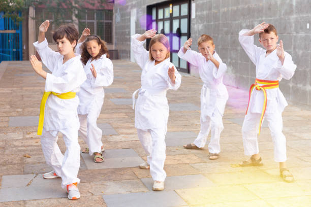 istock Children are standing in the fighting stance karate 1338673764