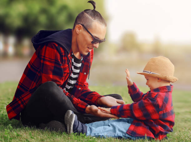 istock dad and his child are playing in a clearing 1338674814