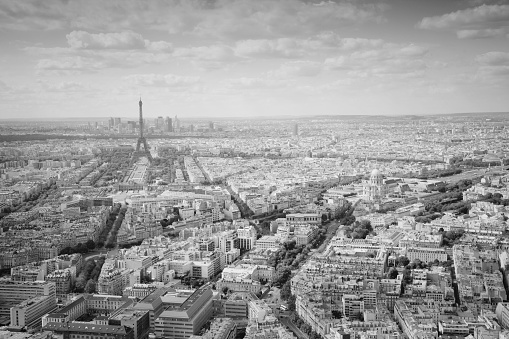 view to Eiffel Tower in Paris, France under blue sky