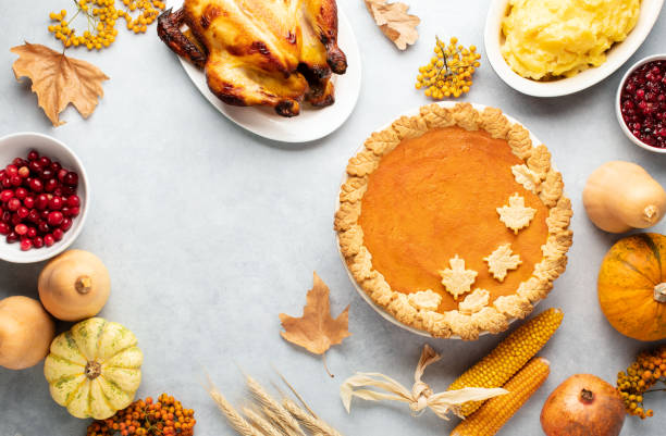 istock Thanksgiving greeting card background or festive dinner invitation template 1338684977