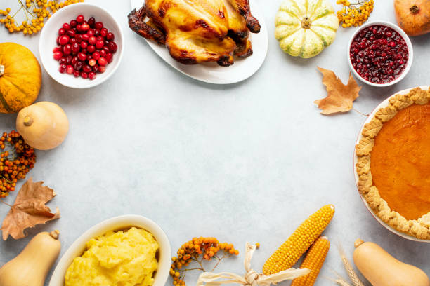 istock Thanksgiving greeting card background or festive dinner invitation template 1338684989