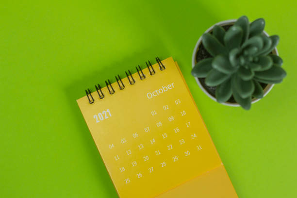 istock Calendar with tear-off sheets for October 2021. A desktop calendar for planning, organizing and managing each date. 1338685988