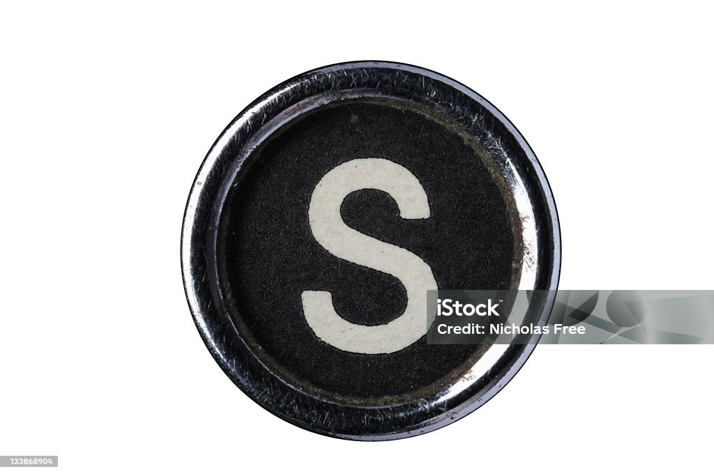 Isolated Letter S Vintage Typerwriter Keys. On pure White Background. Clean of dust and dirt. Scratched corroded and worn to give real character. Letter S Stock Photo