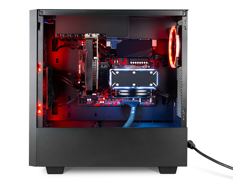 modern black desktop gaming pc with red led lights fan air cooler isolated on white background. computer hardware technology concept