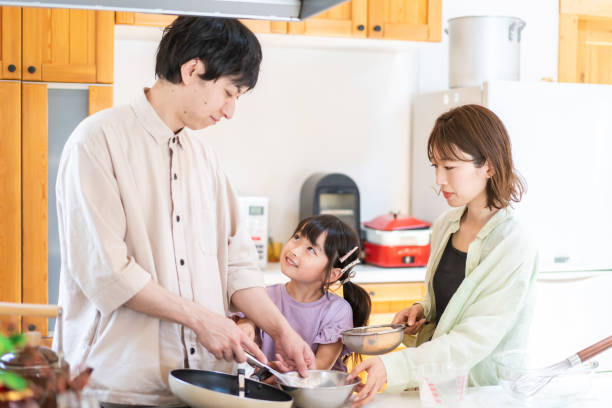 istock A happy family cooking together 1338690341