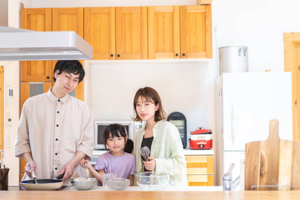 istock A happy family cooking together 1338690342