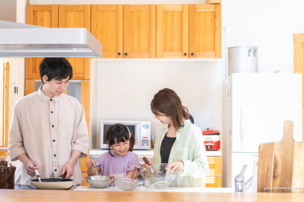 istock A happy family cooking together 1338690344