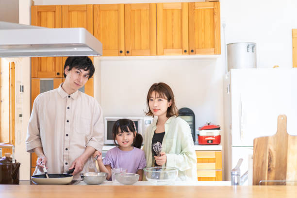 istock A happy family cooking together 1338690350