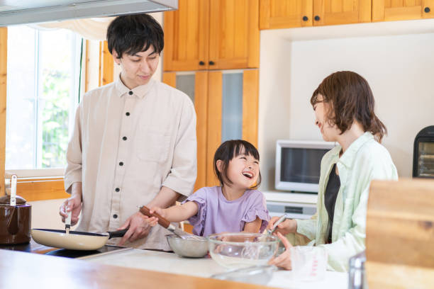 A happy family cooking together