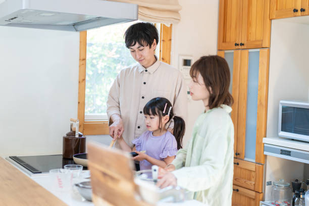 istock A happy family cooking together 1338690354