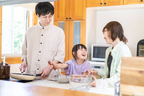 istock A happy family cooking together 1338690359