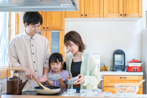 istock A happy family cooking together 1338690360