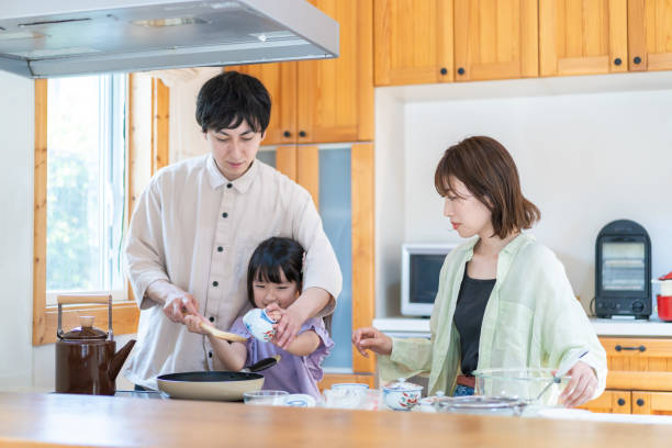 istock A happy family cooking together 1338690361