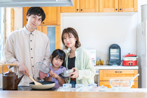 istock A happy family cooking together 1338690367