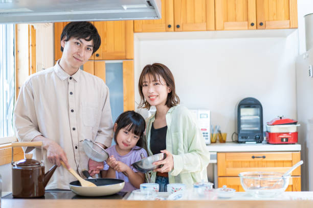 istock A happy family cooking together 1338690372