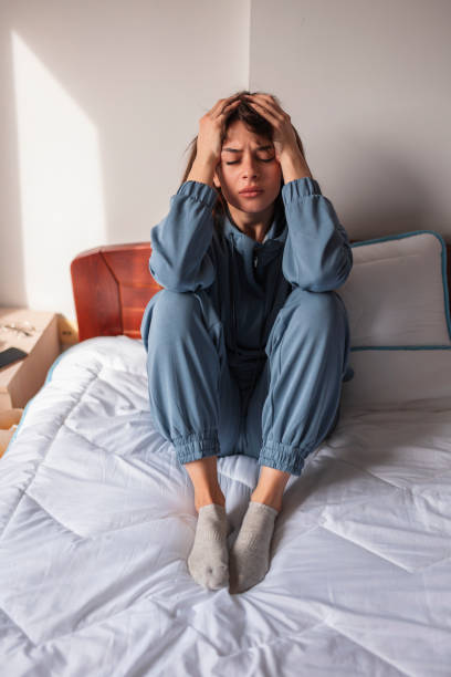 istock Woman having a headache 1338696279