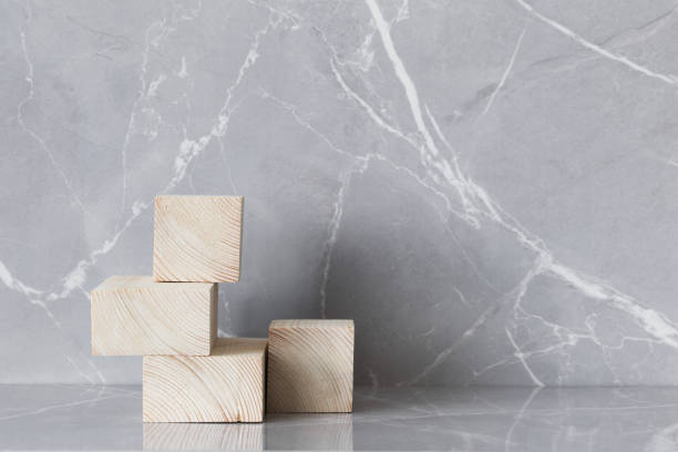 istock wooden podium on gray marble background 1338698755