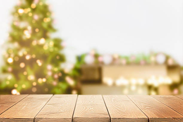 istock christmas background with wooden table for copy space 1338700214