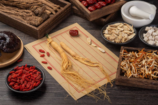 istock Ginseng and traditional Chinese medicine on the table 1338700352