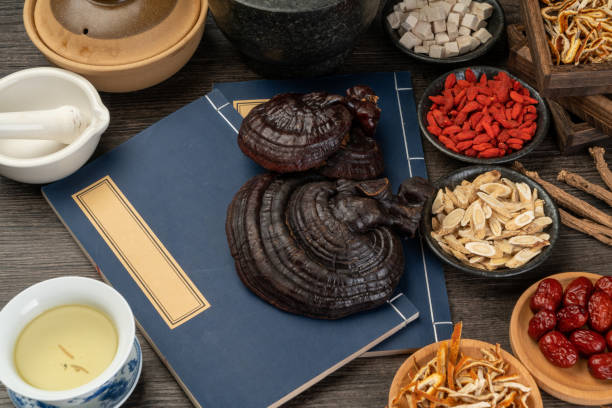 istock Ganoderma lucidum and traditional Chinese medicine on the table 1338700738