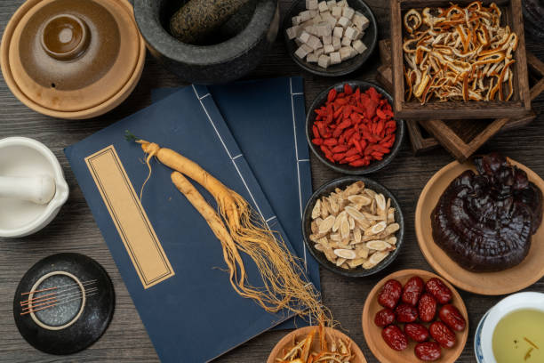 istock Ginseng and traditional Chinese medicine on the table 1338700913