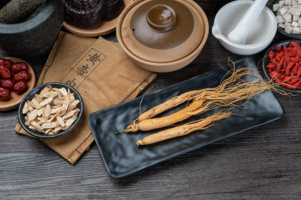 istock Ginseng and traditional Chinese medicine on the table 1338701010