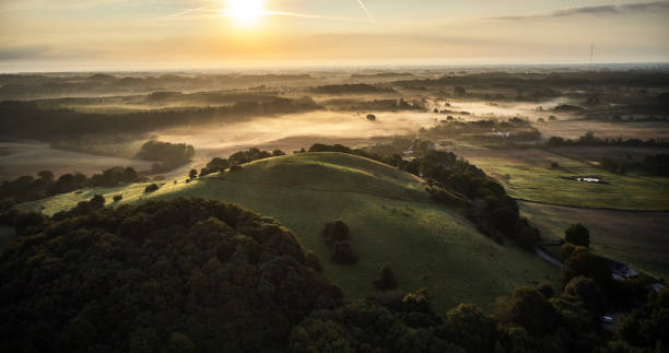 istock Early morning sun strikes the hill top 1338701053