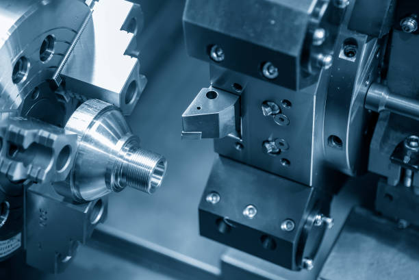 istock The  CNC lathe machine thread cutting at the end metal cone shape parts. 1338702872