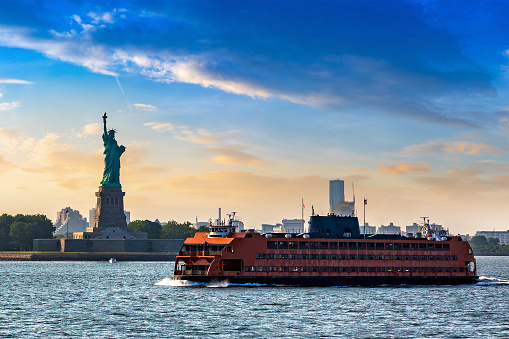 Statue of Liberty at sunset in New York City, NY, USA