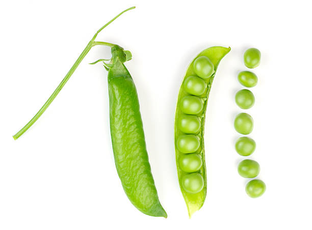 istock Fresh green pea pod over white background 133870736