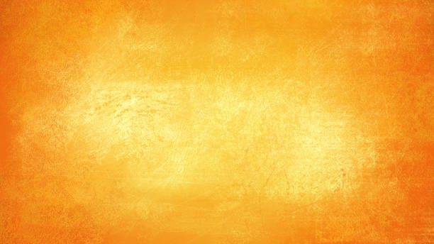 istock Orange and Gold Cement Wall Grunge Abstract Background Texture 1338708190