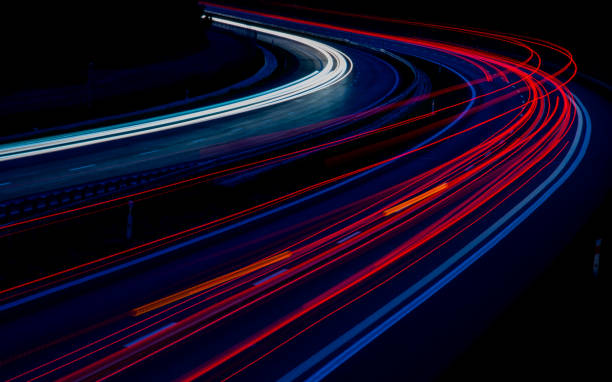 istock lights of cars with night. 1338708413