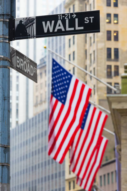istock Low Angle View Of Information Sign With Flags In Background 1338709615
