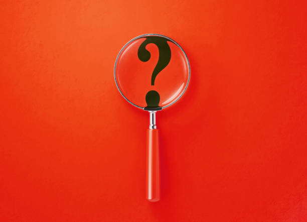 istock Magnifier And Question Mark On Red Background 1338715891
