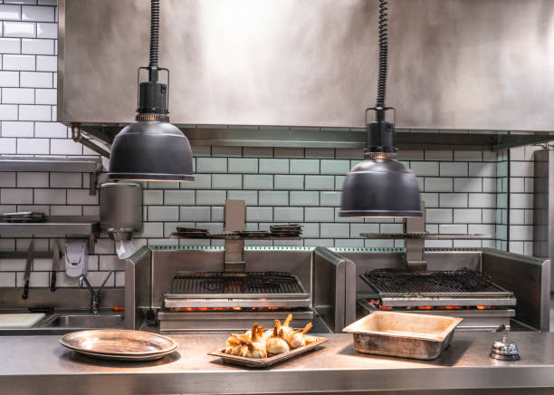 istock Professional restaurant stainless steel kitchen with coal embers grill 1338717806