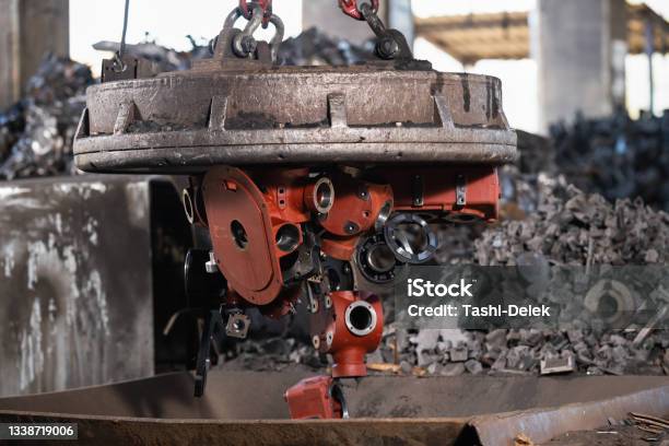Transporting Scrap Steel By Crane Recycling Of Material Stock Photo - Download Image Now