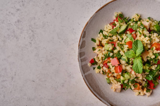 istock Tabbouleh salad. Traditional Middle Eastern dish. Flat lay 1338720117