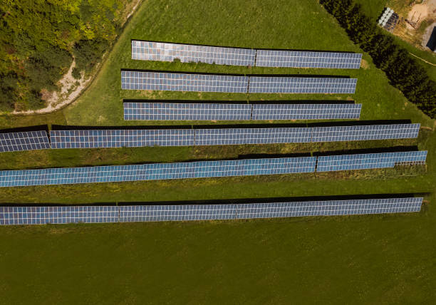 istock Sustainable source of energy - Solar panels on green hill 1338722586