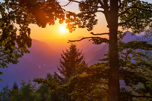 Epic sunset in the mountain valley. Warm summer evening at Kobala, Soca valley, Slovenia