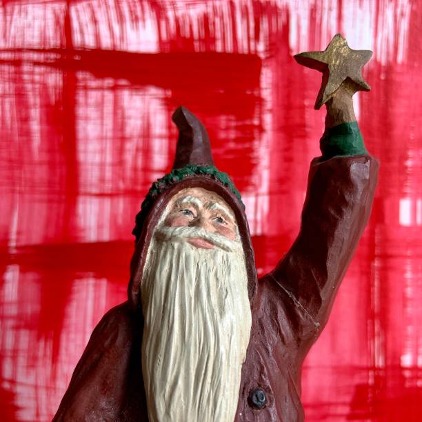 istock Broken Old Santa Holding a Star 1338727526