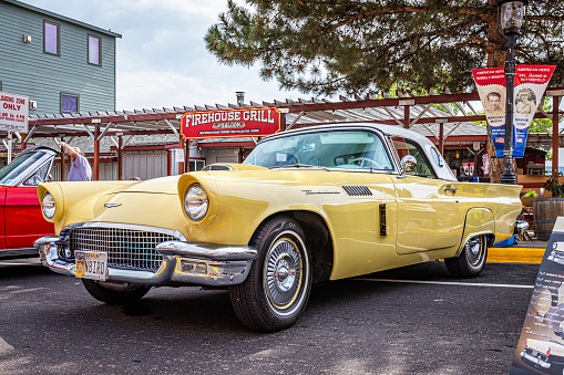 Virginia City, NV - July 30, 2021: 1957 Ford Thunderbird convertible with removable hardtop at a local car show.