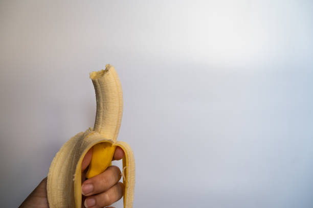 Ripe bananas are peeled, and have bite marks